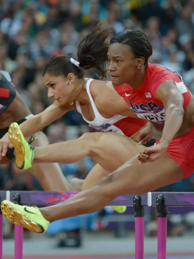 a group of girls performing high jump